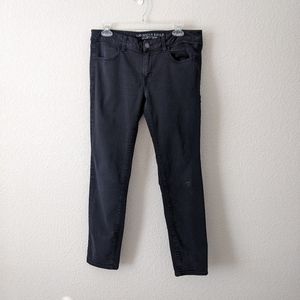 American Eagle 12 black distressed jegging skinny jeans. Low-rise